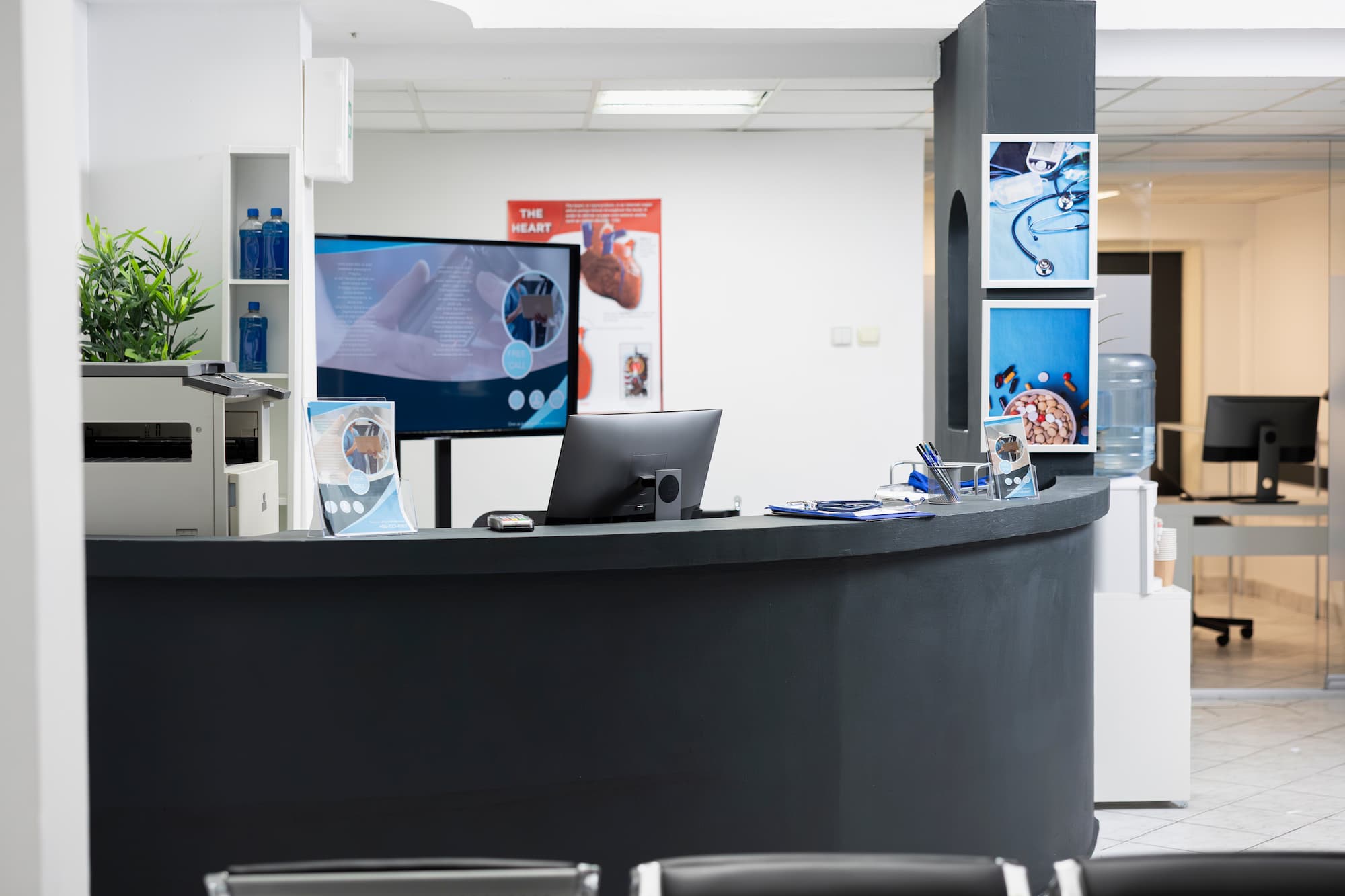 Empty reception desk and waiting area of a medical clinic