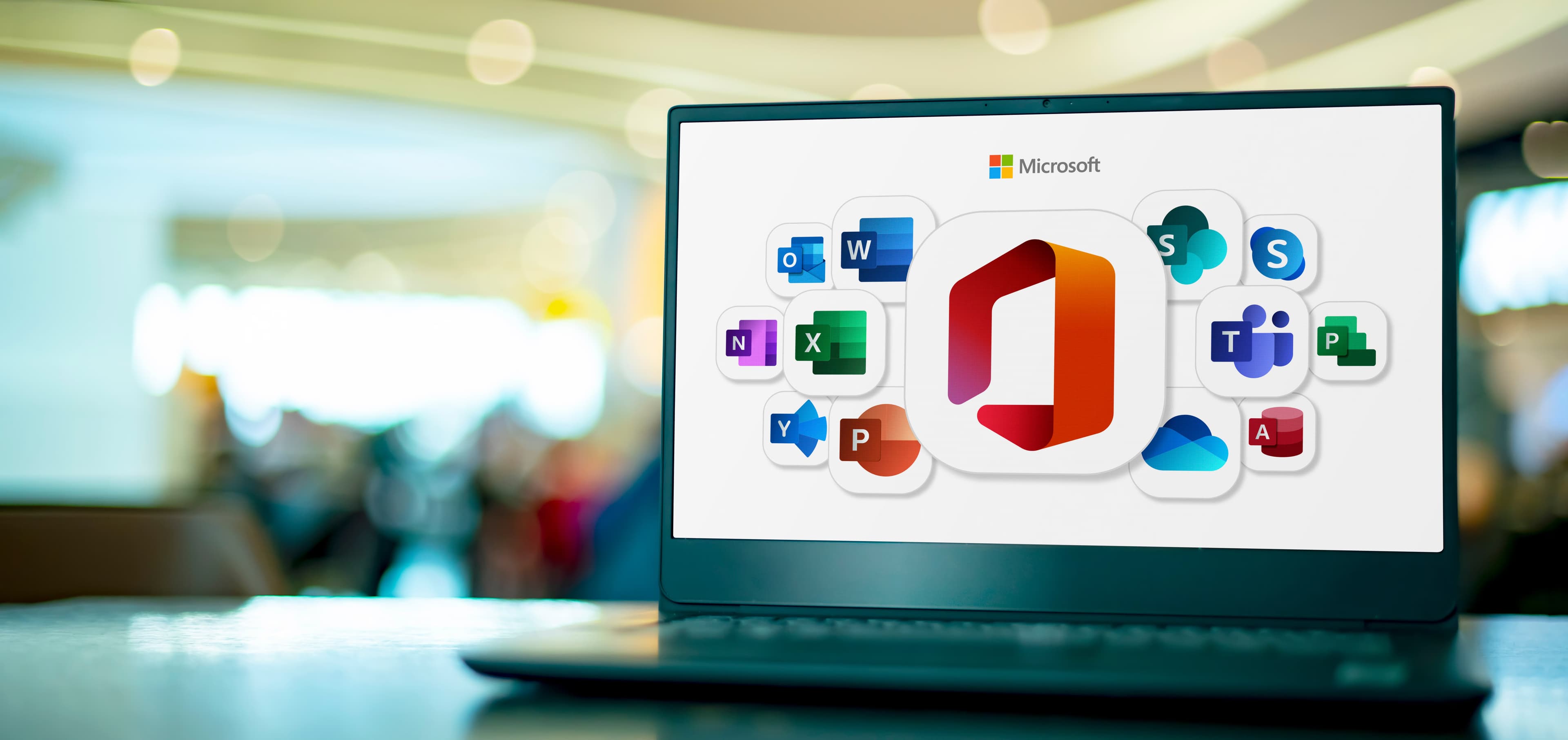 Laptop displaying the Microsoft 365 application suite
