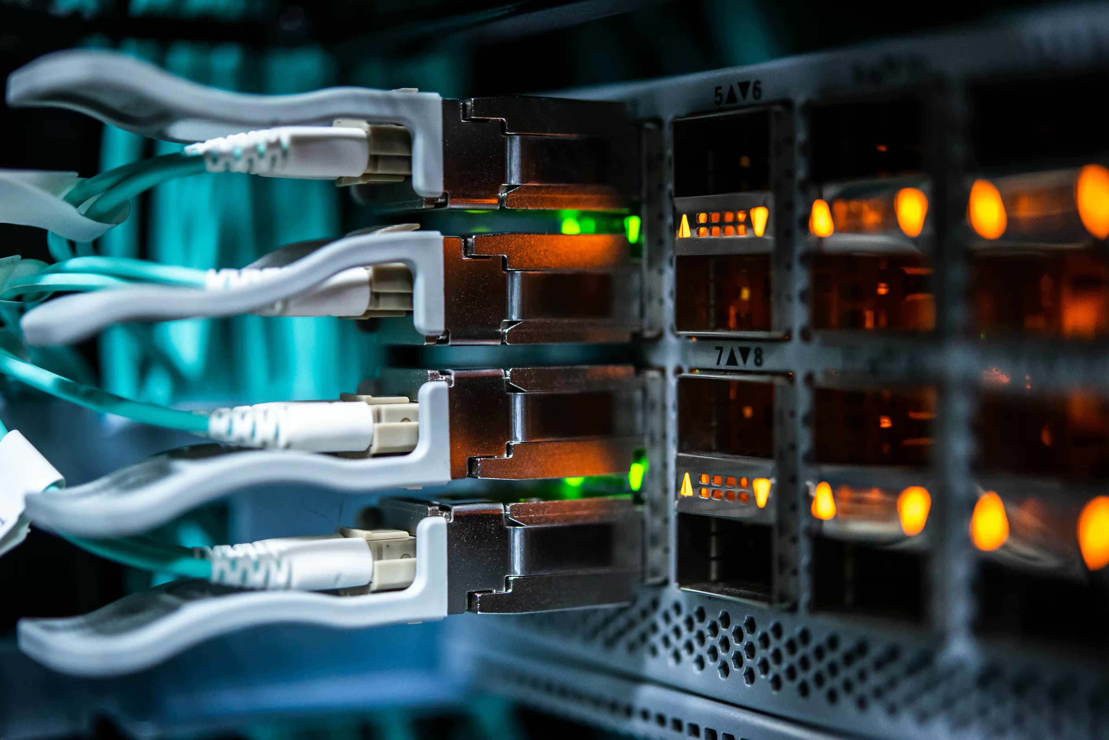 Fibre optic patch cables connected to an enterprise network switch